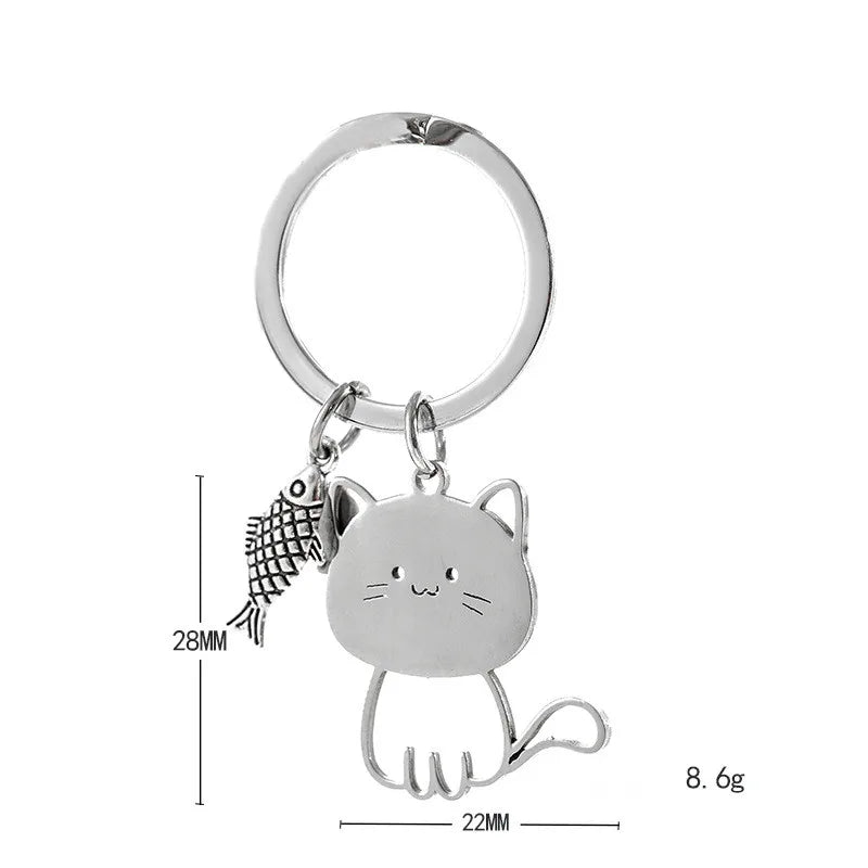 Cat Eyeing the Fish Keychain