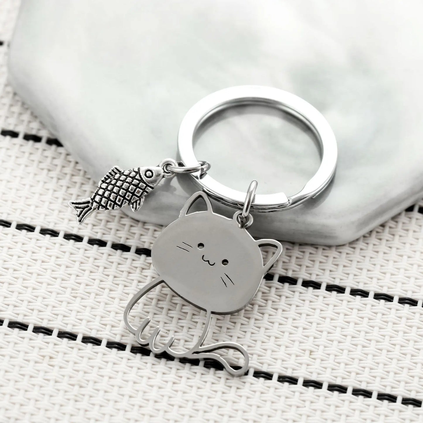 Cat Eyeing the Fish Keychain