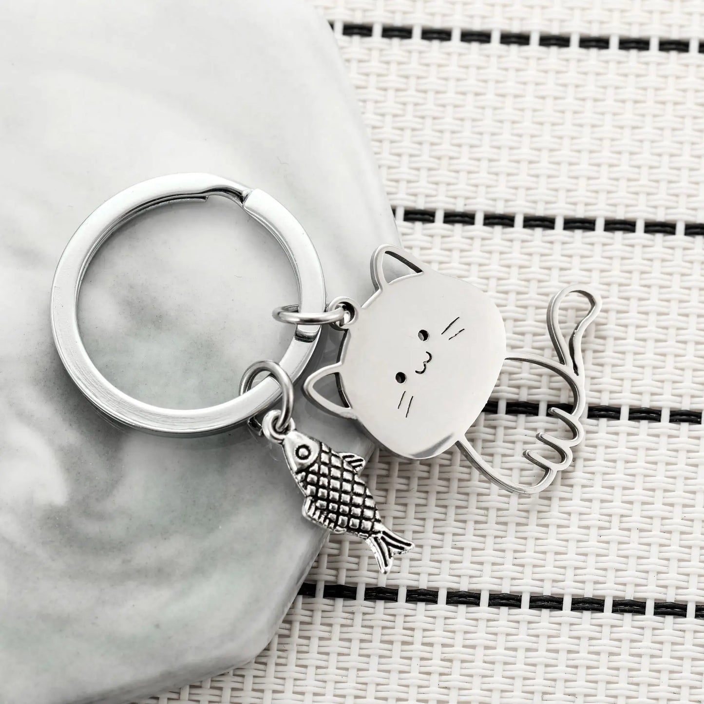 Cat Eyeing the Fish Keychain