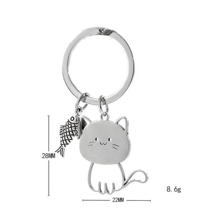 Cat Eyeing the Fish Keychain