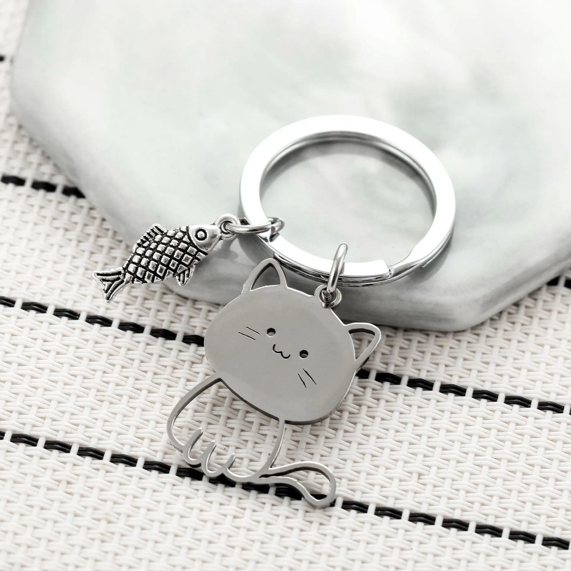 Cat Eyeing the Fish Keychain