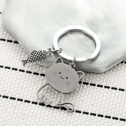 Cat Eyeing the Fish Keychain