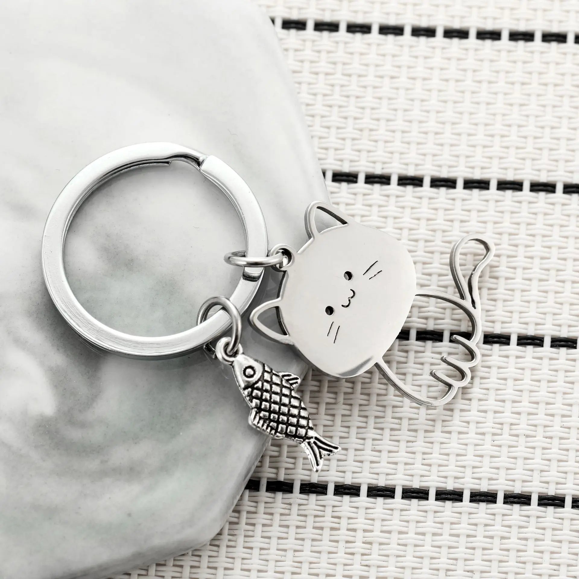 Cat Eyeing the Fish Keychain