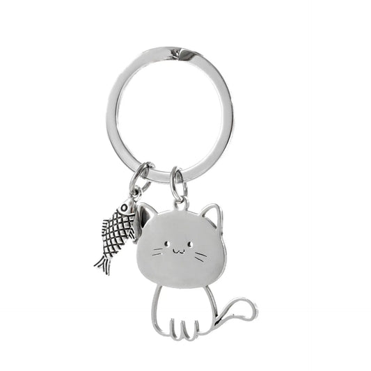 Cat Eyeing the Fish Keychain