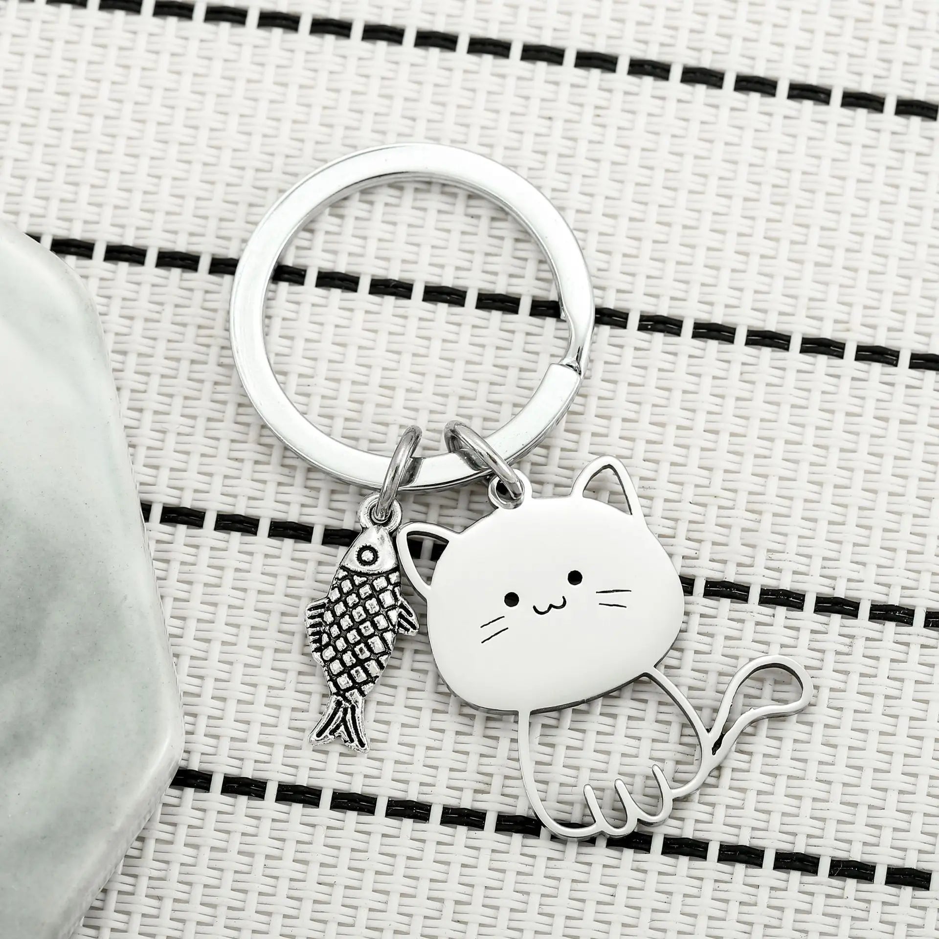 Cat Eyeing the Fish Keychain